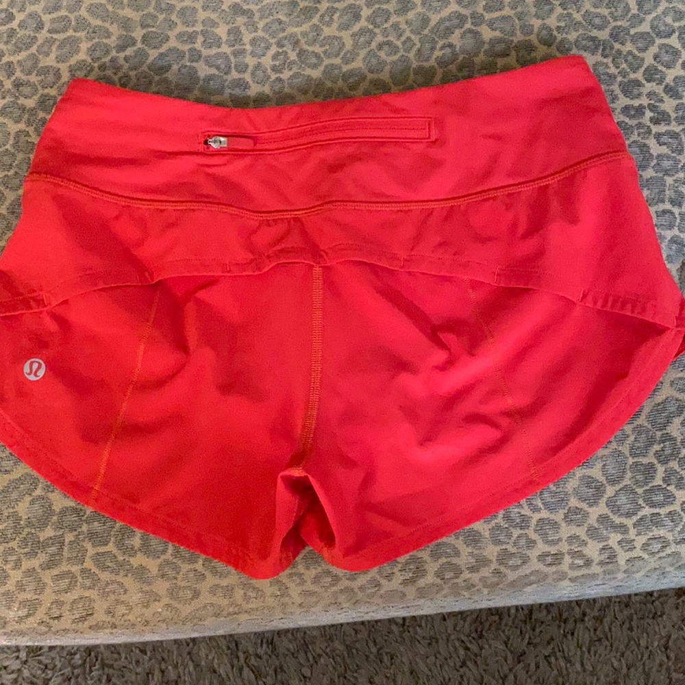 Lululemon orange/red Speed-up shorts size 2.